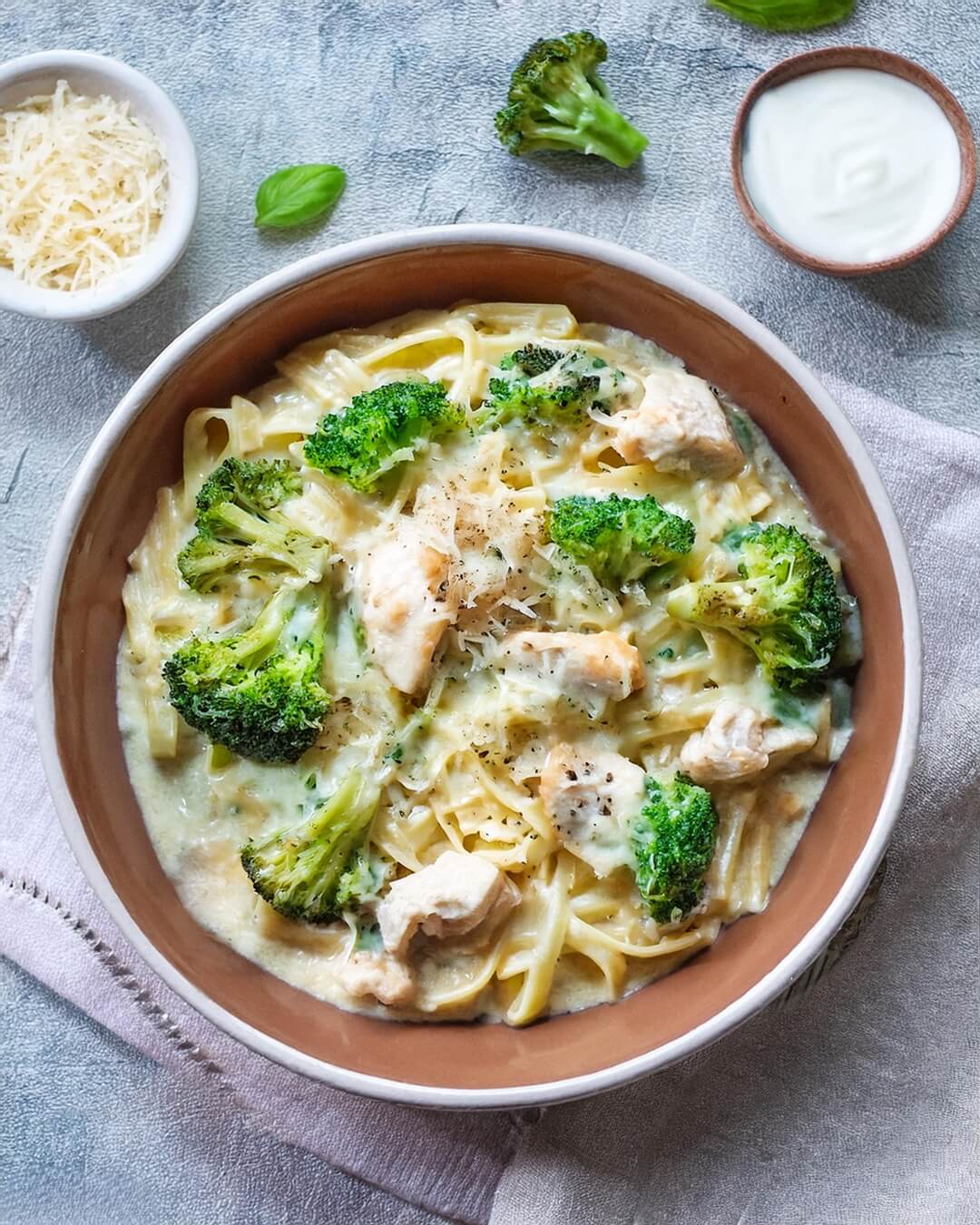 Rich and creamy Chicken Broccoli Alfredo, featuring tender chicken and fresh broccoli florets tossed in a velvety Alfredo sauce made with Parmesan, garlic, and butter. This comforting pasta dish combines al dente fettuccine with a savory cream sauce, offering a delicious blend of flavors in every bite. Perfect for an easy weeknight meal or a family-friendly dinner, this hearty dish is sure to satisfy