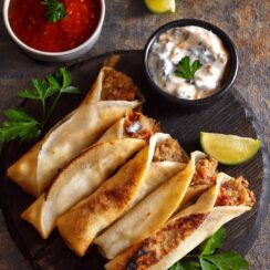 Crunchy Chicken Taquitos, filled with shredded chicken, creamy cheese, and zesty spices, rolled in crispy corn tortillas and fried to golden perfection. These bite-sized, flavorful taquitos are the perfect appetizer or snack, served with guacamole, salsa, or sour cream for dipping. Ideal for parties, game-day spreads, or a fun family meal, these crispy chicken taquitos are a crowd favorite.