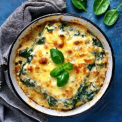 Deliciously layered Chicken Spinach Lasagna, featuring tender chicken, fresh spinach, and creamy ricotta cheese, all baked between layers of lasagna noodles and a rich, savory marinara sauce. This hearty and flavorful dish combines the perfect balance of creamy, cheesy goodness with healthy greens, making it a family favorite for weeknight dinners or special occasions. Serve with garlic bread for a complete and comforting meal