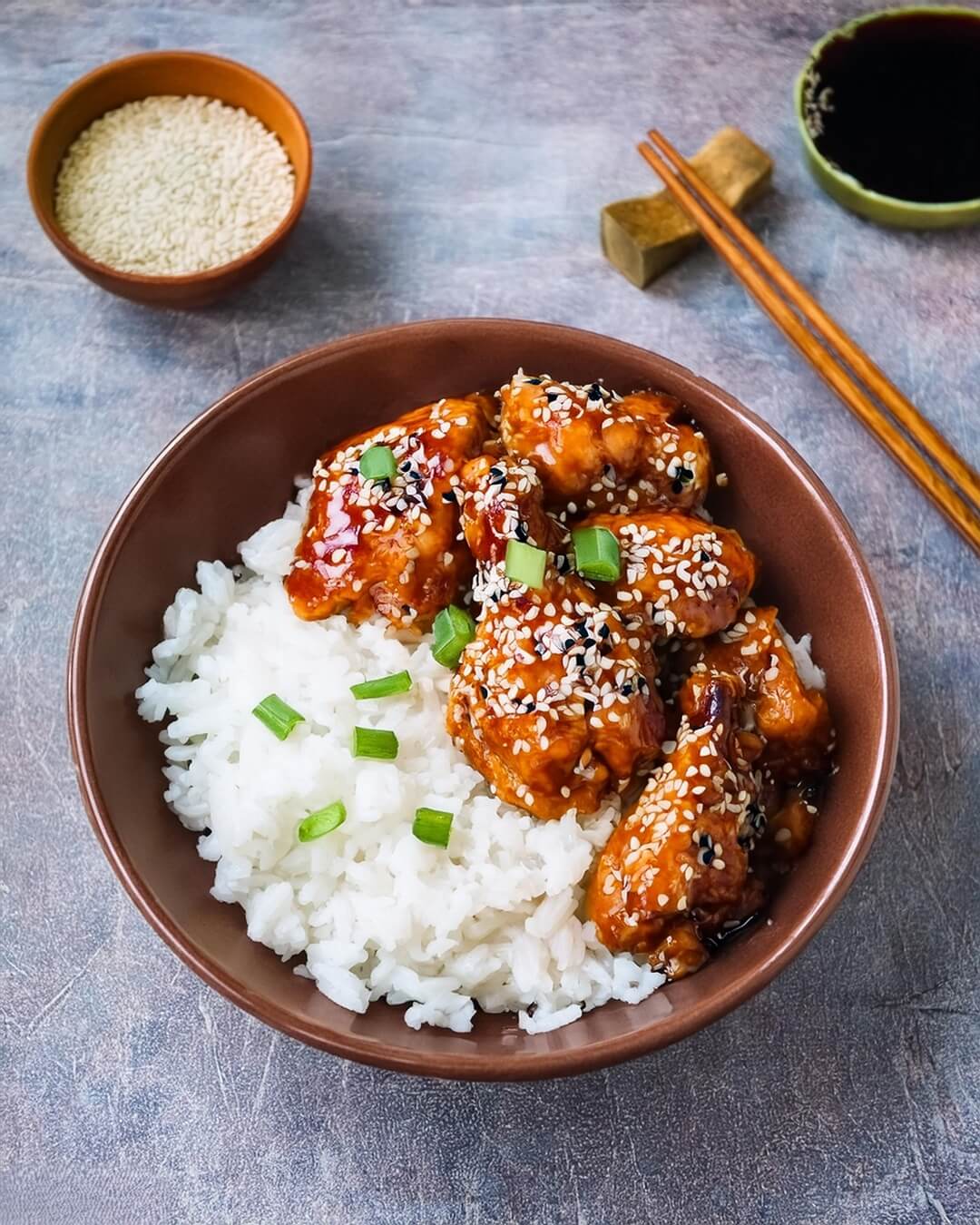 Deliciously crispy Sesame Chicken, featuring bite-sized chicken pieces fried to golden perfection and coated in a sweet and savory sesame sauce. This takeout favorite combines the bold flavors of soy sauce, garlic, and honey, with a sprinkle of toasted sesame seeds for added crunch. Perfect for a quick, homemade dinner, this dish is both satisfying and easy to prepare, offering a flavorful meal the whole family will love