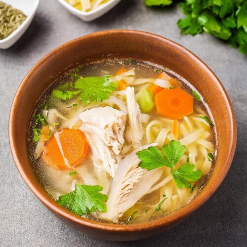 Classic Homemade Chicken Noodle Soup made with tender chicken, hearty egg noodles, and fresh vegetables simmered in a flavorful broth. Infused with garlic, onions, carrots, and celery, this comforting soup is perfect for chilly days or when you need a soothing, wholesome meal. Easy to make and full of rich, savory flavors, this nourishing soup is a family favorite for a reason.