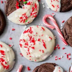 Whenever you're craving a festive and decadent treat, these White Chocolate Dipped Peppermint Chocolate Cookies are the perfect blend of rich chocolate, cool peppermint, and creamy white chocolate. Each cookie is a holiday delight, combining bold flavors and a touch of elegance for a sweet indulgence!