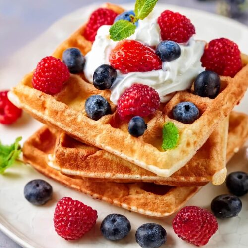 Whenever you're craving a breakfast that’s light yet satisfying, these Crispy Belgian Waffles deliver a golden, airy texture with every bite, perfect for topping with sweetened whipped cream, fresh fruit, or a drizzle of syrup.