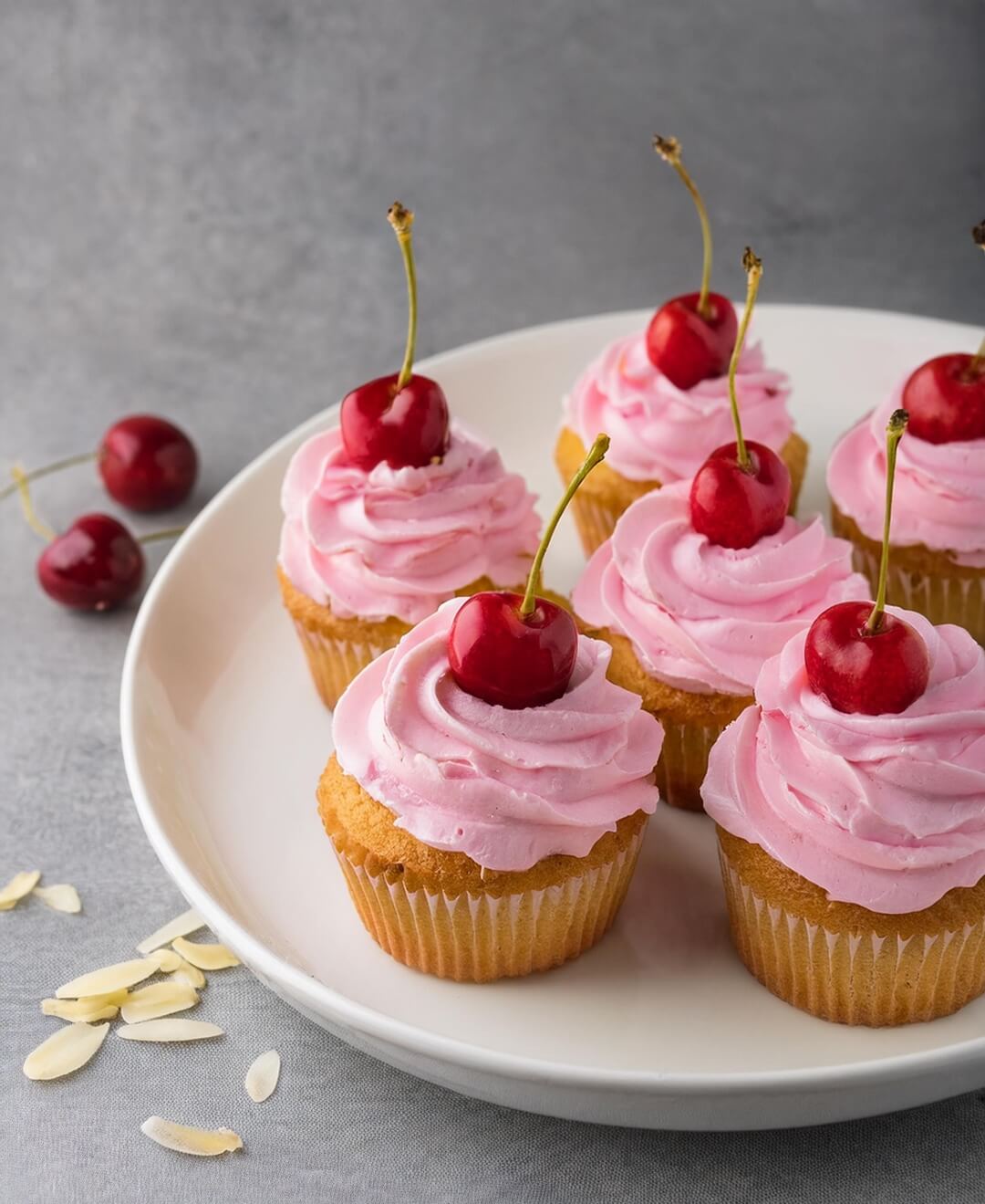 Whenever you're in the mood for something sweet and elegant, these Cherry Almond Cupcakes combine tender almond cake with the sweet, juicy flavor of cherries, creating a delightful dessert perfect for any celebration.