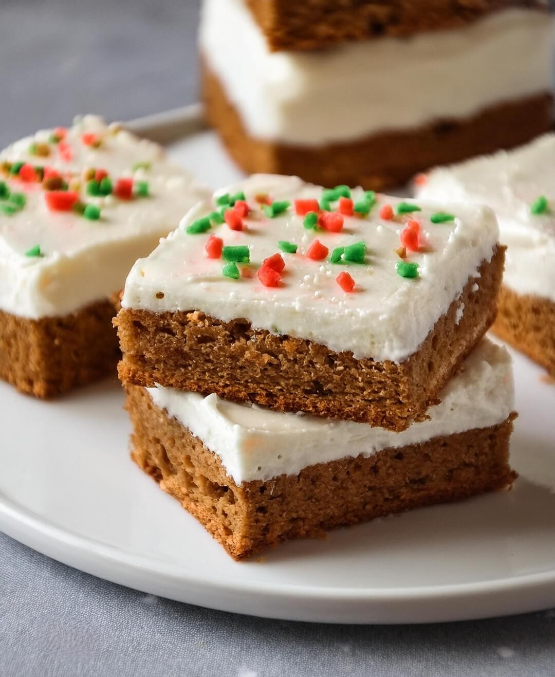 Soft and chewy Gingerbread Bars, filled with the warm, spicy flavors of cinnamon, ginger, and cloves. Topped with a sweet vanilla glaze that perfectly complements the rich molasses base, these bars bring the comforting taste of gingerbread in a simple, delicious form that’s perfect for the holidays.