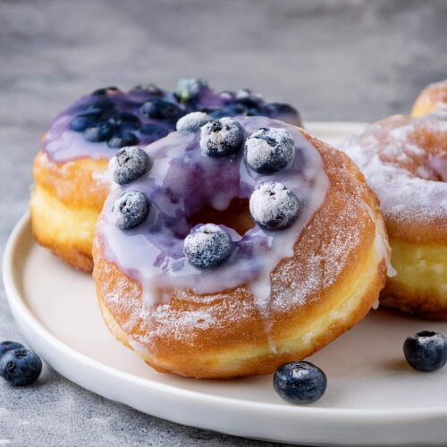 Treat yourself to the perfect blend of sweet and fruity with these irresistible Blueberry Donuts! Each bite offers a delightful burst of juicy blueberries, complemented by a heavenly glaze. Perfect for breakfast or as a sweet snack, this easy recipe will have you coming back for seconds!