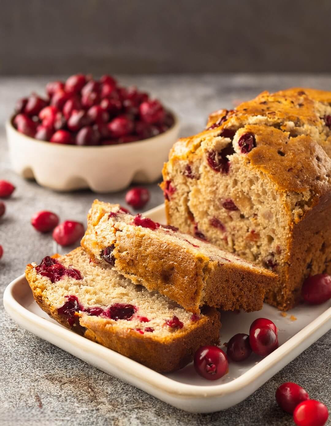 Whenever you want a festive and tangy treat, this Cranberry Bread combines tart, juicy cranberries with a soft, buttery loaf, making it the perfect addition to any holiday spread or cozy afternoon.