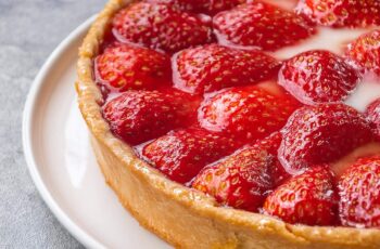Whenever you want a taste of summer, this Strawberry Pie showcases a flaky crust filled with juicy, fresh strawberries, topped with a sweet glaze that makes every slice a refreshing delight.