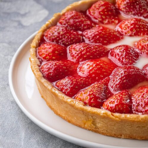 Whenever you want a taste of summer, this Strawberry Pie showcases a flaky crust filled with juicy, fresh strawberries, topped with a sweet glaze that makes every slice a refreshing delight.
