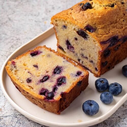 Moist and flavorful Blueberry Banana Bread, packed with ripe bananas and juicy blueberries, creating the perfect balance of sweetness and tartness. This easy-to-make quick bread features a tender crumb and is ideal for breakfast, a snack, or dessert. Bursting with fruity flavors in every bite, this homemade treat pairs wonderfully with a cup of coffee or tea.