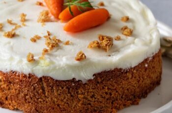 This Carrot Cake with Cream Cheese Frosting is a classic, delicious dessert that never disappoints! Moist and spiced to perfection, the tender carrot cake is filled with the warm flavors of cinnamon, while finely grated carrots add sweetness and texture. The smooth, tangy cream cheese frosting is the perfect complement, making each slice rich and satisfying. Whether for a celebration or just because, this cake is sure to bring joy to any occasion.
