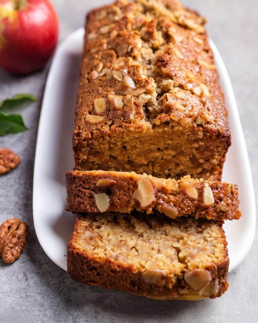 Moist and tender Apple Loaf Cake filled with chunks of fresh apples, warm cinnamon, and a hint of vanilla. This comforting cake is topped with a light cinnamon sugar crust, adding the perfect crunch to each bite. Bursting with fall flavors, this easy-to-make loaf is perfect for breakfast, dessert, or an afternoon snack, offering a delicious taste of homemade comfort.