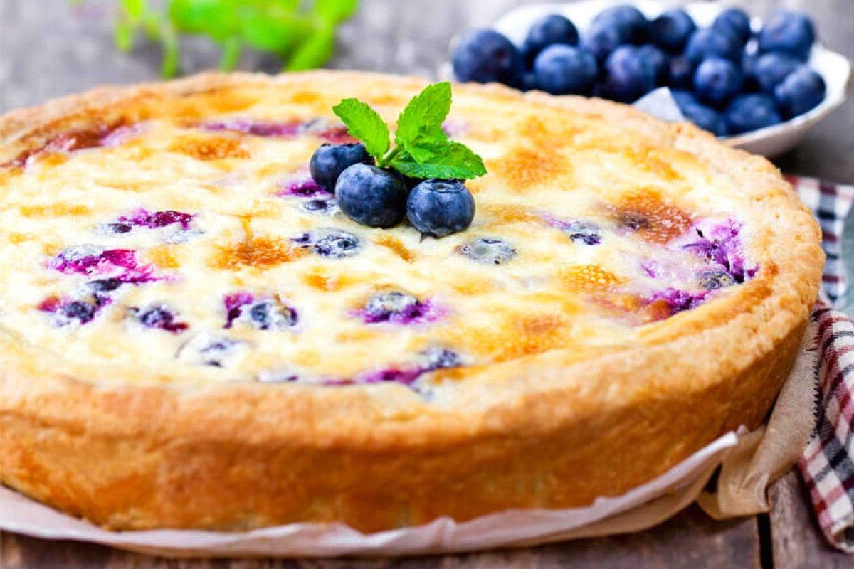 Sweet and Flavored, this easy to make Lemon blueberry cheesecake is the perfect addition to any dessert table!