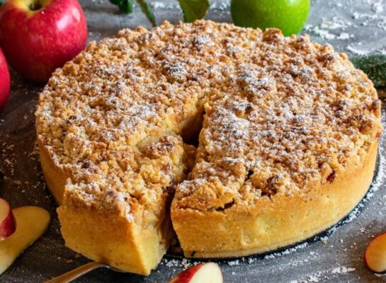 Satisfy your sweet cravings with a slice of pure autumn bliss! Our Apple Crumble Cake is a warm, comforting hug for your taste buds. Imagine tender, cinnamon-kissed apple slices nestled in a bed of buttery, golden crumble topping, all baked to perfection. Each bite is a symphony of flavors, a delightful dance of textures. It's like a cozy sweater for your soul on a crisp fall day.
