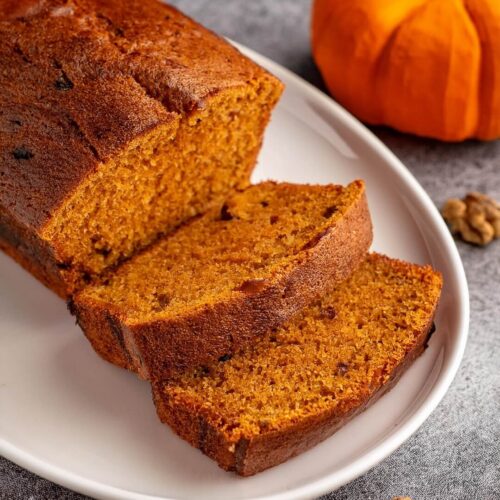 Moist and flavorful Pumpkin Bread, made with real pumpkin puree, warm spices like cinnamon and nutmeg, and a hint of vanilla. This delicious fall favorite is perfect for breakfast, an afternoon snack, or a cozy dessert. With its tender crumb and rich pumpkin flavor, this easy-to-make bread pairs wonderfully with a cup of coffee or tea.