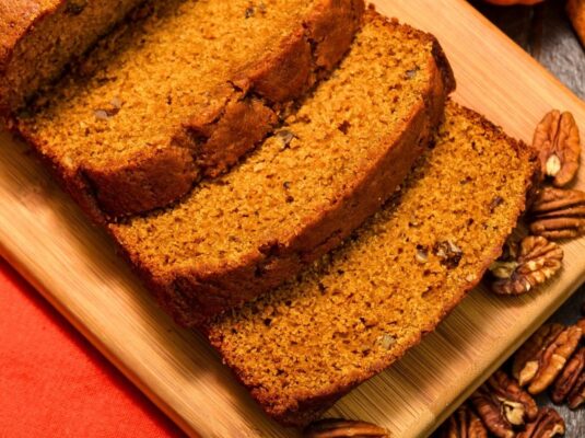 Fall in love with autumn all over again with our Pumpkin Bread. This moist, spiced bread is a celebration of the season, featuring the earthy sweetness of pumpkin complemented by a medley of warm spices like cinnamon, nutmeg, and cloves. Each slice offers a comforting taste of fall, making it a must-have for cozy mornings or a delightful addition to your table.