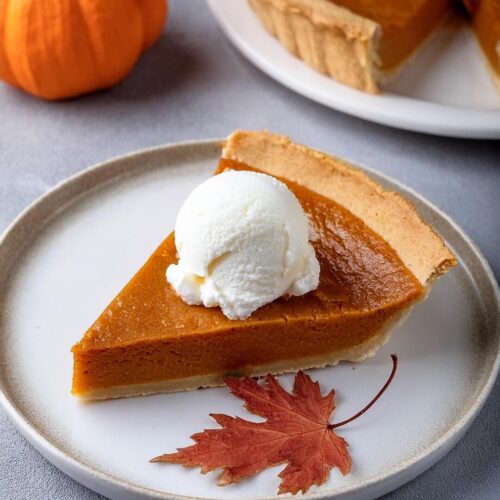 A classic Pumpkin Pie with a smooth, creamy filling that’s perfectly spiced with cinnamon, nutmeg, and cloves. The flaky, buttery crust complements the rich pumpkin filling, creating a cozy dessert that’s ideal for fall gatherings or holiday celebrations. Serve with a dollop of whipped cream for the perfect finishing touch.