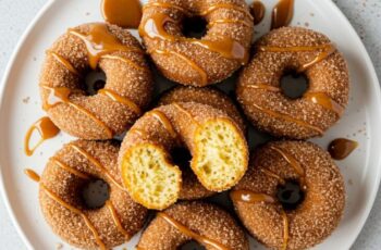 These Apple Cider Donuts are soft, spiced, and coated in cinnamon sugar. A cozy fall treat perfect for breakfast, brunch, or dessert.