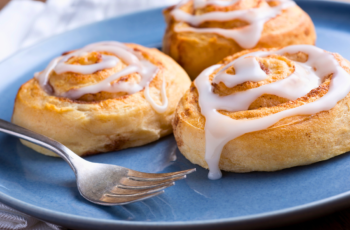 These homemade Cinnamon Rolls are a classic favorite. They're exceptionally soft, and fluffy, and possess just the right amount of chewiness with a delightful touch of gooeyness. These rolls are generously infused with the delightful essence of cinnamon and generously coated with a delectable cream cheese cinnamon roll icing. You'll treasure this recipe for a lifetime!