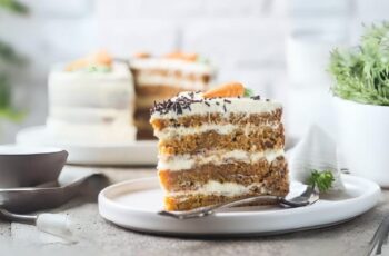 Four-layer carrot cake is a towering masterpiece of culinary art. Each layer is a symphony of moist, spiced carrot-infused cake, interspersed with velvety cream cheese frosting, creating a perfect balance of sweetness and richness. This decadent dessert is an exquisite treat for those who appreciate the delightful combination of flavors and textures.