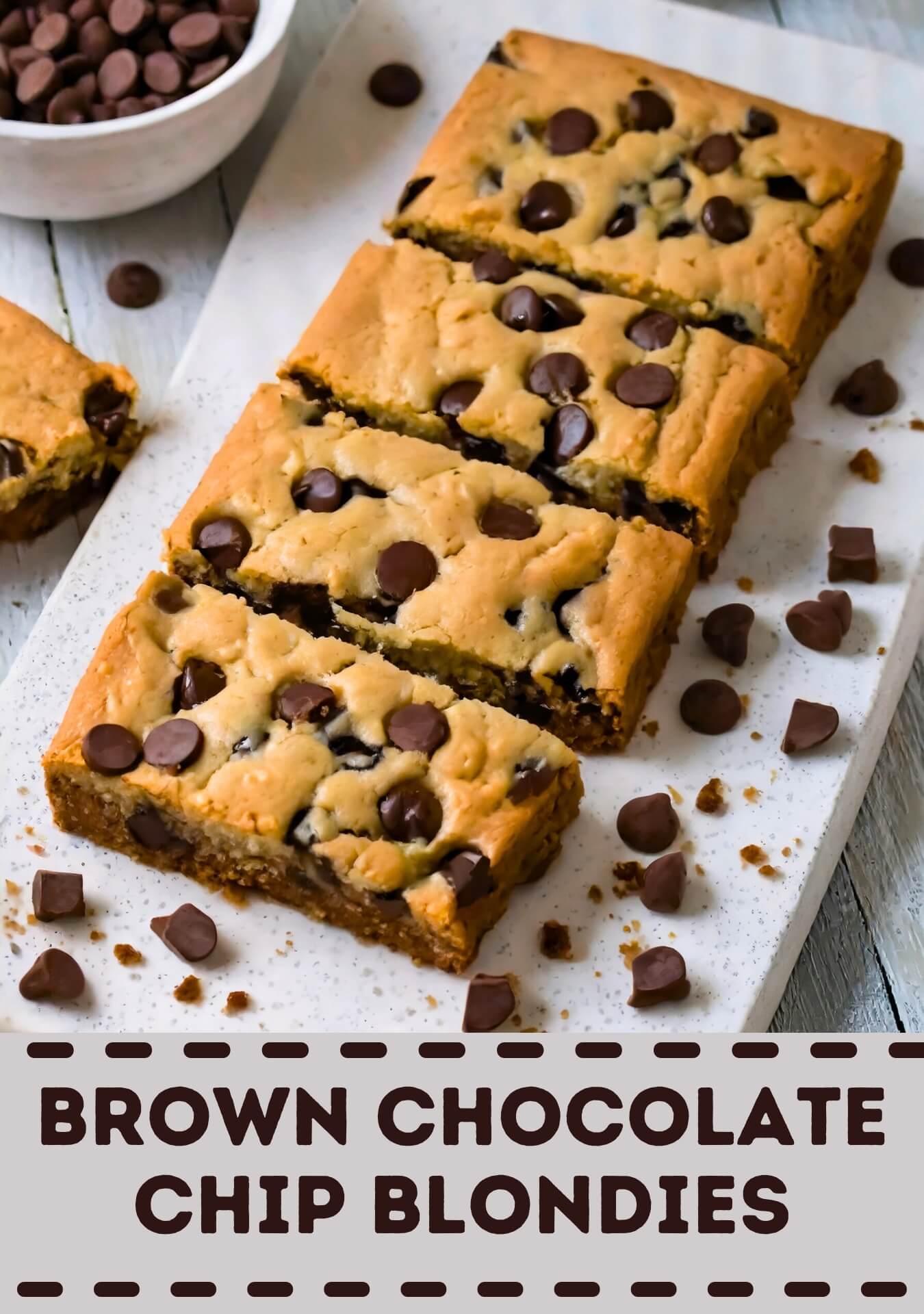 Scrumptious brown chocolate chip blondies, offering a delightful twist on the classic brownie. These golden bars boast a buttery and vanilla-infused base with a perfect balance of sweetness. Generously studded with chocolate chips throughout, each blondie promises melty pockets of chocolate goodness. The texture is dense and chewy, providing a satisfying contrast to the creamy richness of the chocolate. The aroma is a tempting blend of sweet vanilla and the enticing scent of baking chocolate. With their golden-brown tops and gooey interior, these brown chocolate chip blondies are a heavenly treat for those who appreciate the comforting flavors of classic blondies with a chocolatey twist. Perfect for satisfying sweet cravings or sharing on any occasion.