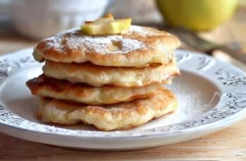 Delicious mini apple pancakes that offer a delightful twist on the classic breakfast favorite. These bite-sized wonders are infused with the comforting flavors of apples and warm spices, creating a perfect blend of sweetness and autumnal warmth. The pancake batter is studded with finely diced apples, providing juicy bursts of fruit in every bite. Once cooked to golden perfection, these mini pancakes are often topped with a drizzle of maple syrup, a dollop of whipped cream, or a sprinkle of cinnamon for an extra layer of flavor. Their miniature size makes them ideal for breakfast buffets, brunches, or even as a fun and shareable snack. These mini apple pancakes are a charming and flavorful way to start your day with a touch of seasonal goodness.