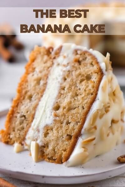 Enjoy the comforting flavors of homemade banana cake, perfect for any occasion. This moist and tender cake is made with ripe bananas, adding natural sweetness and a delightful aroma. Topped with a rich cream cheese frosting, each slice offers a perfect balance of sweetness and tanginess. Garnished with banana slices and a sprinkle of chopped nuts, this banana cake is a delicious treat for breakfast, dessert, or a midday snack