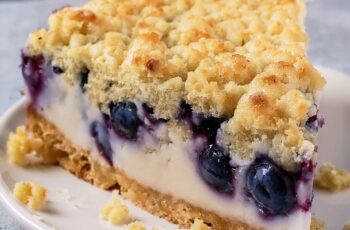 This Blueberry Cheesecake Crumb Cake is the ultimate treat—rich, creamy cheesecake meets juicy blueberries and buttery crumble in every bite!
