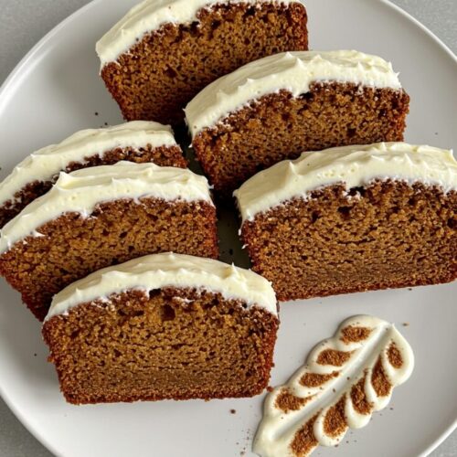 Recreate Starbucks’ beloved gingerbread loaf at home—moist, spiced with warm ginger and nutmeg, and topped with a thick layer of creamy frosting. Cozy comfort in every bite!