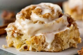 Embark on a flavor-filled journey with our Apple Crisp Cinnamon Rolls, a delightful twist on a classic favorite. Envision soft and fluffy cinnamon rolls generously filled with a delectable mixture of spiced apple slices, brown sugar, and cinnamon. Each roll is a harmonious blend of sweet and tart, with the warmth of cinnamon complementing the tender apple filling. Topped with a crisp and buttery crumble, these rolls are a symphony of textures and flavors that evoke the comforting essence of apple crisp. Drizzled with a sweet glaze, our Apple Crisp Cinnamon Rolls are a delectable treat that brings the cozy flavors of fall to your table.