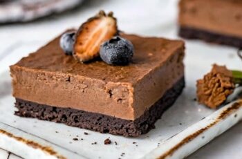 Indulge in the rich decadence of our Chocolate Cheesecake Bars, a heavenly treat that combines velvety cheesecake with indulgent chocolate. Picture a buttery graham cracker crust, topped with a layer of creamy cheesecake filling infused with rich chocolate flavor. Each bite is a luxurious combination of smooth creaminess and decadent chocolate, with the perfect balance of sweetness and richness. Whether enjoyed as a dessert for a special occasion or as a delightful indulgence any time of day, our Chocolate Cheesecake Bars are sure to satisfy your sweet cravings and leave you wanting more.