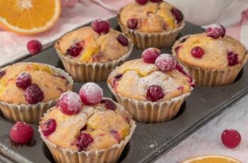 Enjoy the perfect blend of tart cranberries and citrusy orange with our Cranberry Orange Muffins, a delightful treat that's bursting with flavor. Imagine moist and tender muffins infused with the tangy zest of fresh oranges and studded with juicy cranberries. Each bite is a symphony of sweet and tart flavors, with the citrusy brightness of the orange perfectly complementing the tartness of the cranberries. Finished with a sprinkle of sugar or a drizzle of orange glaze, these muffins are a delicious addition to any breakfast or brunch spread. Whether enjoyed warm from the oven or at room temperature, our Cranberry Orange Muffins are sure to brighten your day.