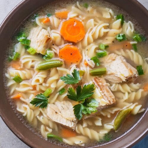 Comforting Instant Pot Turkey Noodle Soup, featuring tender chunks of turkey, hearty egg noodles, and a flavorful broth infused with aromatic herbs and vegetables. This quick and easy soup is perfect for using up leftover turkey and comes together in no time with the help of an Instant Pot. Ideal for chilly days, this warm and nourishing soup is a family favorite that's both satisfying and delicious.