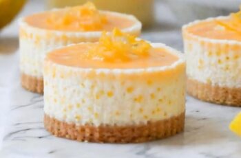 Indulge in the tangy sweetness of our Mini Lemon Cheesecakes, delightful individual treats bursting with citrus flavor. Picture creamy and velvety cheesecake filling infused with the zest of fresh lemons, nestled atop a buttery graham cracker crust. Each bite-sized cheesecake is a perfect balance of tanginess and sweetness, with the refreshing lemon flavor shining through. Topped with a dollop of whipped cream and a twist of lemon zest, these mini cheesecakes are not only delicious but also visually appealing. Whether enjoyed as a dessert at a party or as a sweet treat for yourself, our Mini Lemon Cheesecakes are sure to brighten any occasion.
