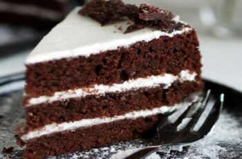 Delight in the decadent combination of rich chocolate cake and creamy cream cheese frosting with our Chocolate Cake with Cream Cheese Frosting, a heavenly treat that's sure to satisfy any sweet tooth. Picture layers of moist and tender chocolate cake, sandwiched together and generously frosted with a luscious cream cheese frosting. Each slice is a symphony of flavors and textures, with the indulgent richness of the chocolate cake perfectly complemented by the tangy sweetness of the cream cheese frosting. Whether enjoyed for a special celebration or as a comforting indulgence any time of day, our Chocolate Cake with Cream Cheese Frosting is sure to be a hit with family and friends.