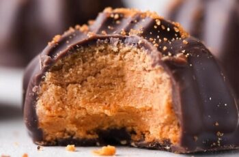 Indulge in the irresistible flavor of Biscoff truffles. These bite-sized delights feature a creamy Biscoff filling enrobed in a smooth chocolate coating. Each truffle is garnished with a sprinkle of crushed Biscoff cookies, adding a delightful crunch to every bite. Perfect for gifting, parties, or a luxurious treat, these homemade Biscoff truffles are a must-try for cookie butter enthusiasts.