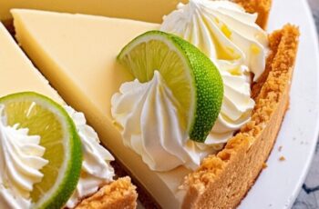 Embark on a culinary journey to the tropics with our tantalizing Key Lime Cheesecake. Imagine a velvety smooth cheesecake infused with the tangy zest of fresh key limes, perfectly complemented by a buttery graham cracker crust. Each decadent bite is a symphony of creamy richness and vibrant citrus flavor, transporting your taste buds to sun-soaked shores and cool ocean breezes. Topped with a generous swirl of whipped cream and garnished with delicate lime zest curls, this dessert is a refreshing and indulgent delight for any occasion.