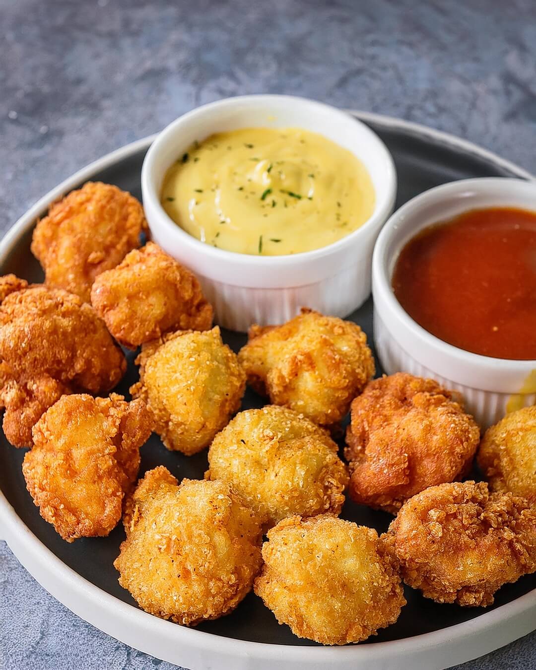Whenever you're craving a crispy and tropical twist on a favorite, this Coconut Popcorn Chicken combines tender chicken bites with a crunchy coconut coating, making it an irresistible snack or appetizer. Whenever you're craving a crispy and tropical twist on a favorite, this Coconut Popcorn Chicken combines tender chicken bites with a crunchy coconut coating, making it an irresistible snack or appetizer.
