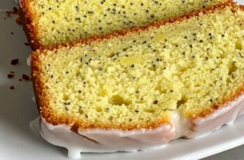 Soft, moist lemon poppy seed bread infused with citrus zest and topped with a sweet glaze for a refreshing bakery-style treat.