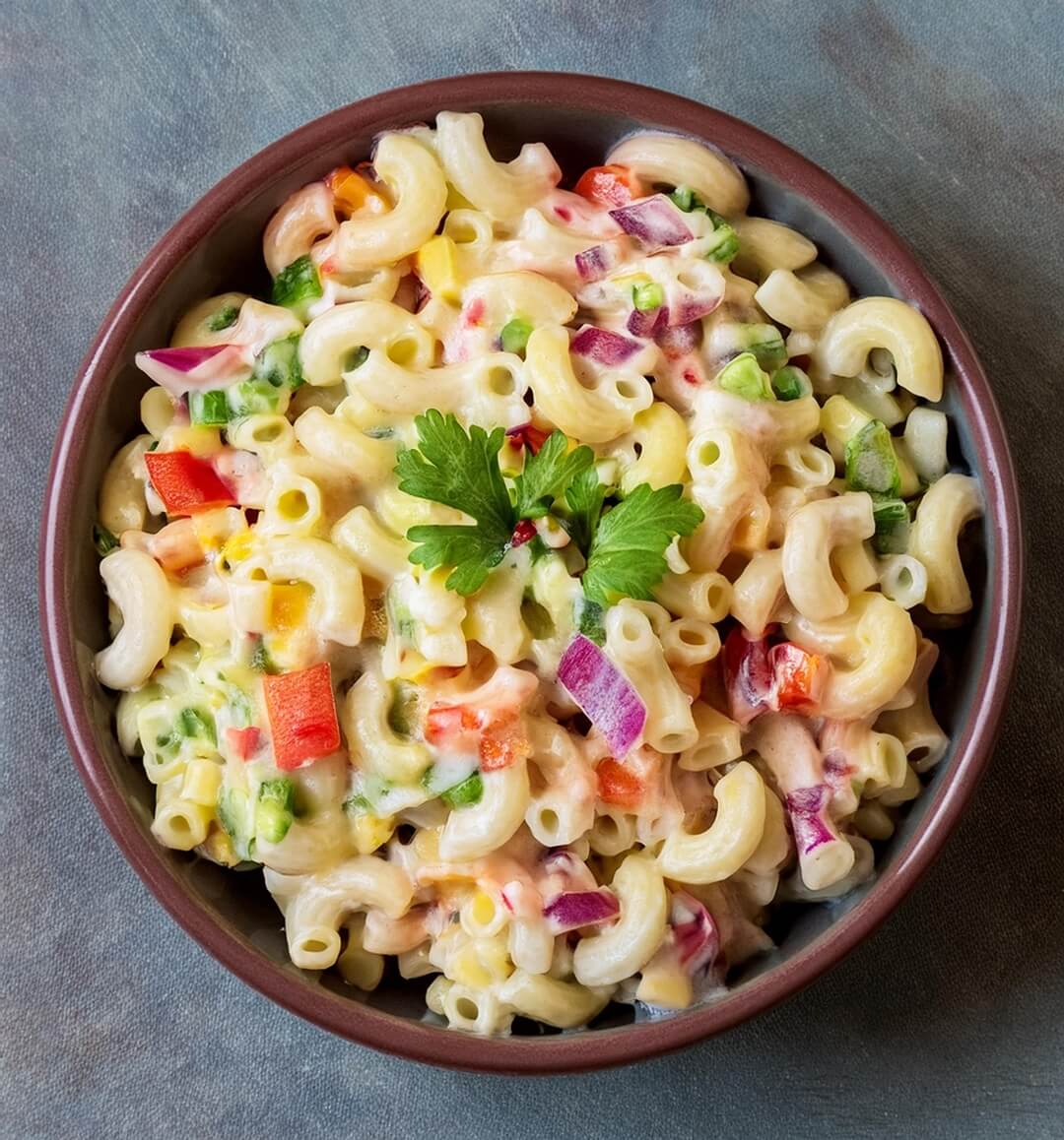When it comes to classic side dishes, Macaroni Salad is a timeless favorite. This creamy, flavorful dish combines tender elbow macaroni with a variety of fresh vegetables, all tossed in a tangy mayonnaise dressing. Perfect for picnics, barbecues, or as a side for any meal, it’s a versatile and delicious option that’s sure to please.