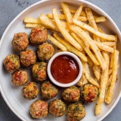 Air Fryer Meatballs are a quick and flavorful way to enjoy a classic dish, with Parmesan, Italian herbs, and breadcrumbs creating a tender, savory bite. The air fryer ensures a crispy exterior and a juicy interior, making these meatballs perfect as a main dish, appetizer, or addition to pasta dishes.
