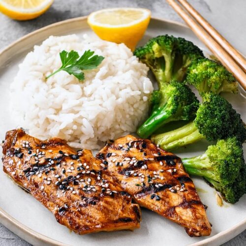 This Asian Grilled Chicken is a flavorful dish that’s sure to impress! Marinated in a delicious blend of soy sauce, ginger, garlic, and sesame oil, the chicken absorbs all the rich, savory flavors. Grilled to perfection, it boasts a beautiful char and juicy tenderness in every bite. Serve it over rice or alongside fresh veggies for a complete meal that’s both healthy and satisfying. Perfect for weeknight dinners or outdoor gatherings, this recipe will bring a taste of Asia to your table. Ready to fire up the grill? Check out the recipe and enjoy this mouthwatering dish!