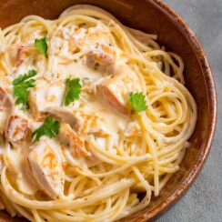 Chicken Spaghetti combines tender chicken, spaghetti, and a creamy, cheesy sauce with subtle heat from tomatoes and chiles, resulting in a comforting, flavorful pasta dish.