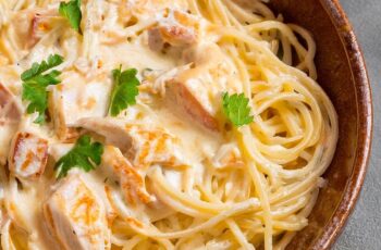 Chicken Spaghetti combines tender chicken, spaghetti, and a creamy, cheesy sauce with subtle heat from tomatoes and chiles, resulting in a comforting, flavorful pasta dish.