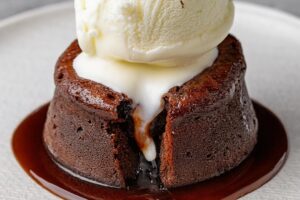 This Chocolate Lava Cake is the ultimate dessert for chocolate lovers! With its rich, molten center and tender cake exterior, every spoonful is a decadent experience. The warm, flowing chocolate contrasts perfectly with the soft cake, creating an indulgent treat that’s perfect for special occasions or an easy dessert when you want to impress. Serve it with a scoop of ice cream or a dusting of powdered sugar for the perfect finishing touch.