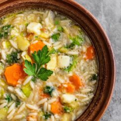 This Orzo Vegetable Soup is a warm and comforting bowl of goodness, packed with vibrant vegetables. It’s a light yet satisfying soup, featuring a colorful medley of carrots, celery, zucchini, and tomatoes, all simmered in a flavorful broth. The orzo adds a lovely texture, making each spoonful hearty and delicious. With a sprinkle of fresh herbs and a squeeze of lemon for brightness, this soup is perfect for a cozy meal or a refreshing lunch.