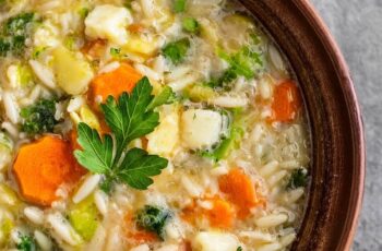 This Orzo Vegetable Soup is a warm and comforting bowl of goodness, packed with vibrant vegetables. It’s a light yet satisfying soup, featuring a colorful medley of carrots, celery, zucchini, and tomatoes, all simmered in a flavorful broth. The orzo adds a lovely texture, making each spoonful hearty and delicious. With a sprinkle of fresh herbs and a squeeze of lemon for brightness, this soup is perfect for a cozy meal or a refreshing lunch.