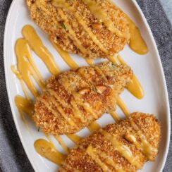 Pecan Crusted Chicken is a delightful dish that pairs juicy chicken breasts with a crispy pecan coating, all brought together with a tangy honey mustard glaze. Ideal for weeknight dinners or special gatherings, this recipe will impress family and friends alike.