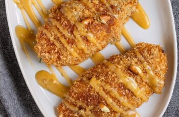 Pecan Crusted Chicken is a delightful dish that pairs juicy chicken breasts with a crispy pecan coating, all brought together with a tangy honey mustard glaze. Ideal for weeknight dinners or special gatherings, this recipe will impress family and friends alike.