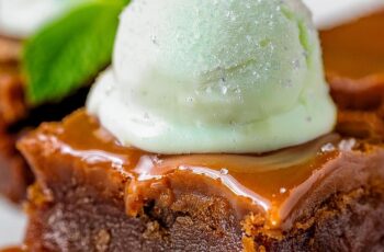 These Salted Caramel Brownies are an indulgent dessert that combines rich, gooey brownies with a decadent salted caramel swirl and a refreshing scoop of mint ice cream. The fudgy brownies are perfectly balanced by the sweet and salty caramel, creating a flavor explosion with every bite. Topped with cool, creamy mint ice cream, this dessert offers the ultimate contrast between warm, chocolatey richness and cool, refreshing mint. It’s a dessert experience that’s both comforting and refreshing.